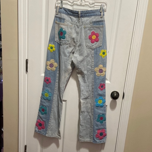 Blue Flare Jeans with Colorful Floral Accents - Picture 4 of 8
